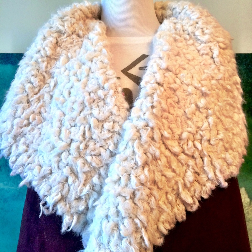 Maroon and faux fur cozy vest.